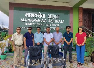 Rotary Club distributes wheelchairs